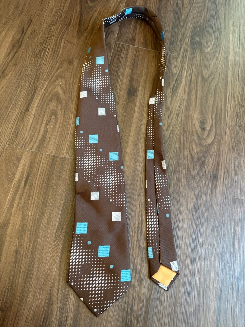 Men's Brown Geometric Tie with Teal and Cream Accents